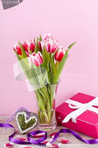 Image of pink and white tulips present ribbon easter birthday