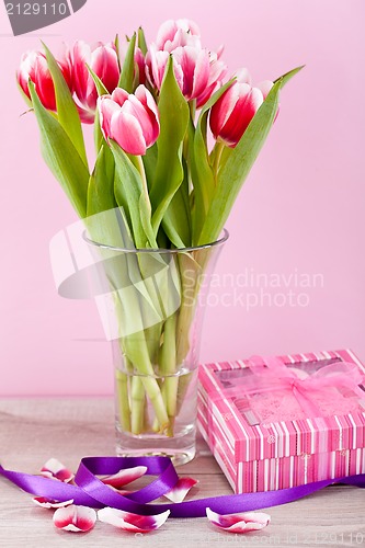 Image of pink and white tulips present ribbon easter birthday