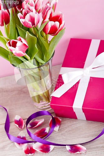 Image of pink and white tulips present ribbon easter birthday