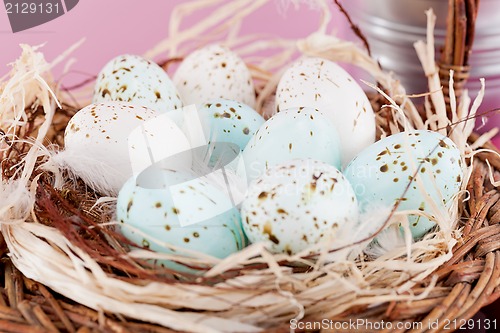 Image of pink present and colorful tulips festive easter decoration