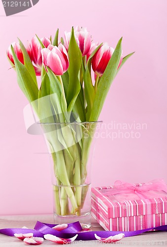 Image of pink and white tulips present ribbon easter birthday