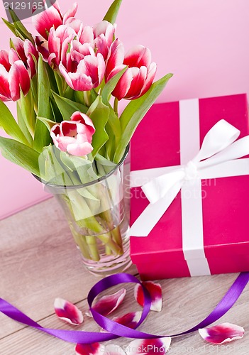 Image of pink and white tulips present ribbon easter birthday