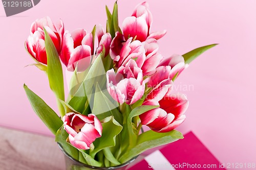 Image of pink and white tulips present ribbon easter birthday