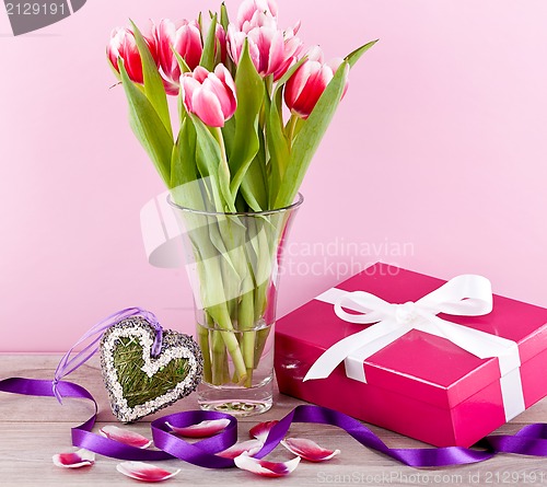 Image of pink and white tulips present ribbon easter birthday