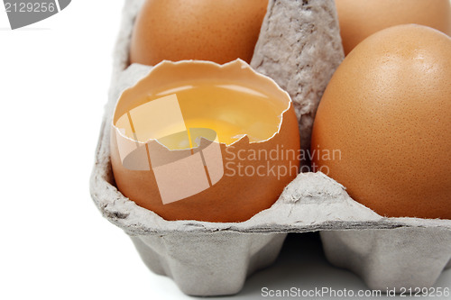 Image of Broken egg in eggbox