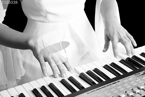 Image of Playing piano