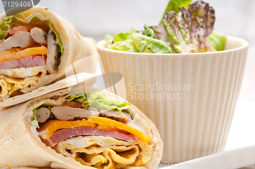 Image of club sandwich pita bread roll