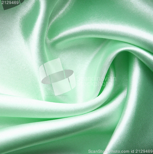 Image of Smooth elegant blue silk as background