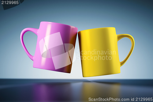 Image of weightless coffee mugs