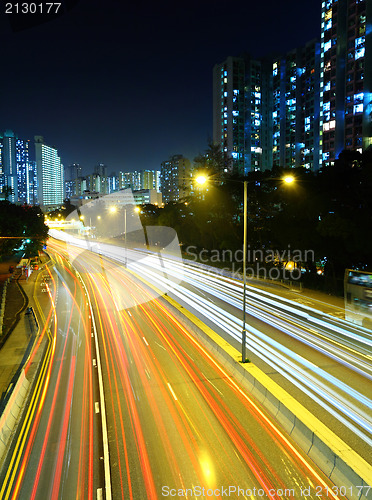 Image of light trails on highway 