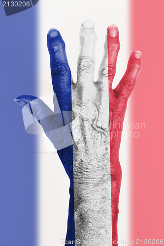 Image of Old hand with flag, European Union, France