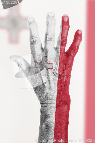 Image of Old hand with flag, European Union, Malta