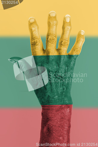 Image of Old hand with flag, European Union, Lithuania