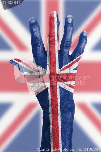 Image of Old hand with flag, European Union, UK