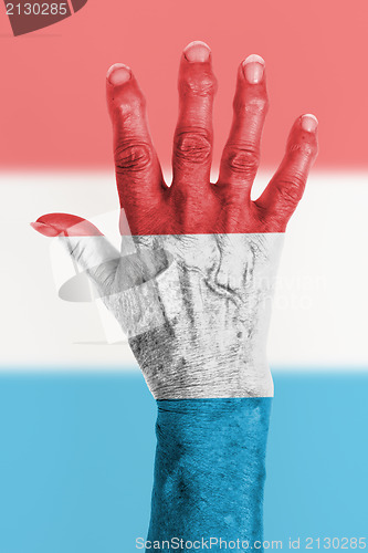 Image of Old hand with flag, European Union, Luxembourg