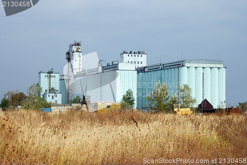 Image of Grain elevator rises among the steppe