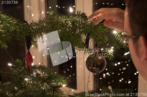 Image of Decorating The Christmas Tree