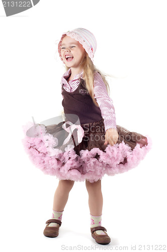 Image of Little laughing girl in studio