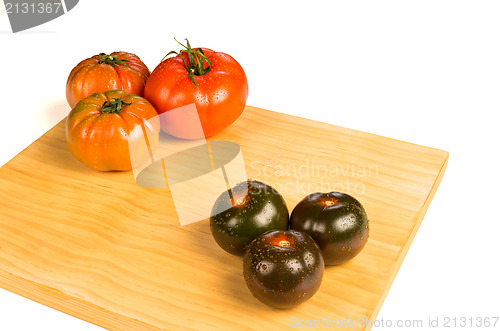 Image of Red and green tomatoes