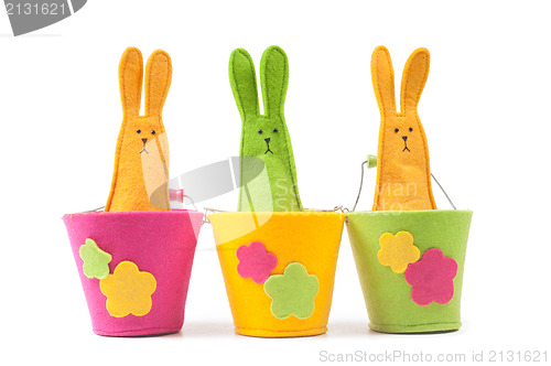 Image of Multicolored easter bunnies sitting in row