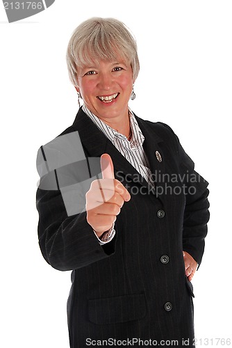 Image of senior business woman thumbs up