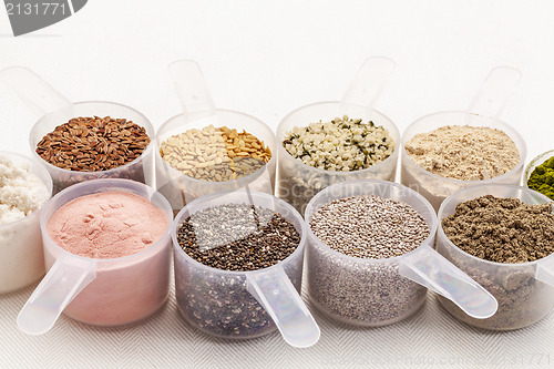 Image of scoops of seeds and powders