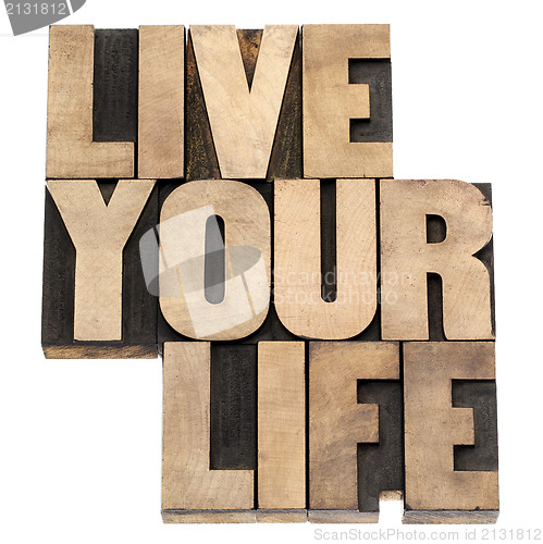 Image of live your life in wood type