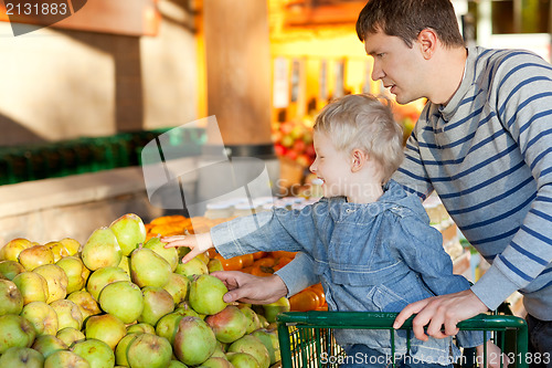 Image of family at the market