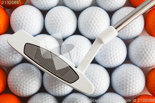 Image of Golf putter and balls