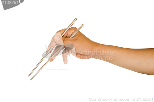 Image of isolated hand holding chopstick