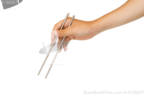 Image of isolated hand holding chopstick