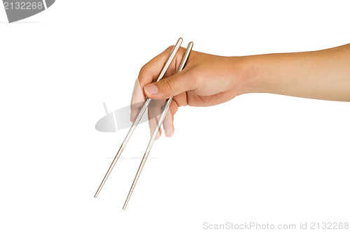 Image of isolated hand holding chopstick