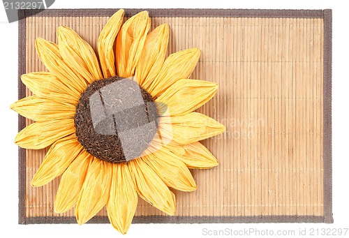 Image of sunflower decoration on wooden table setting background