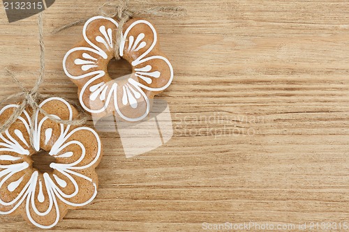Image of Gingerbread cookies on wooden background