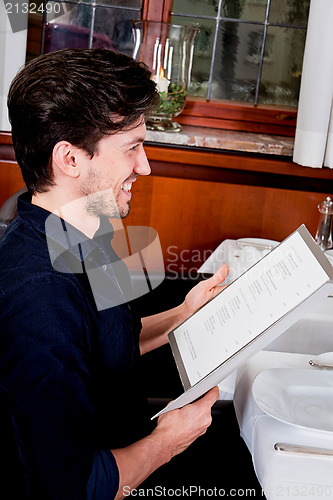 Image of man and woman in restaurant for dinner