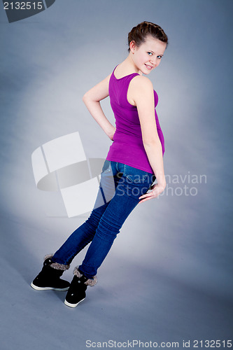 Image of young teenager girl smiling having fun