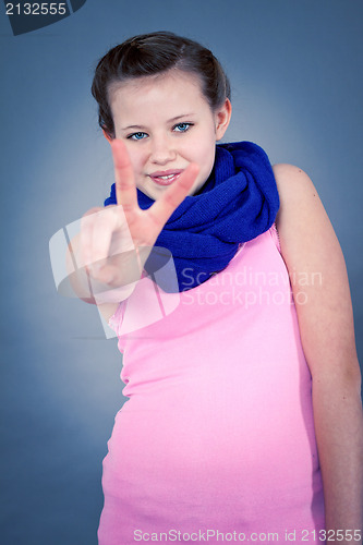 Image of young teenager girl smiling having fun