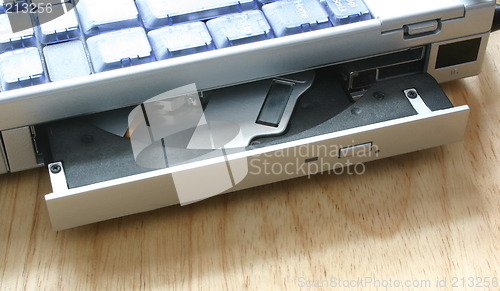 Image of open laptop cd drive