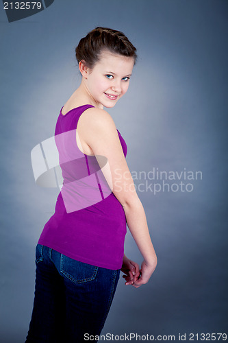 Image of young teenager girl smiling having fun