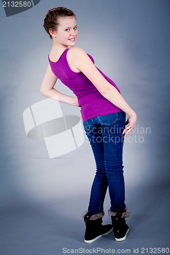 Image of young teenager girl smiling having fun