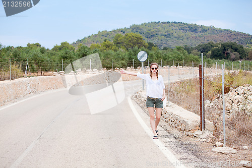 Image of attractive blond woman in summer holiday