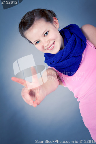 Image of young teenager girl smiling having fun