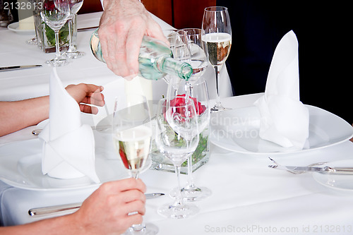 Image of man and woman for dinner in restaurant