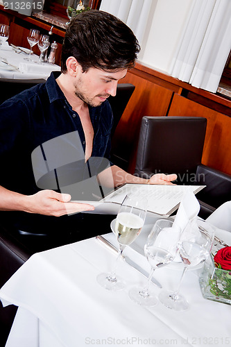 Image of man and woman in restaurant for dinner