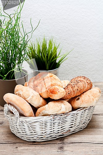 Image of traditional french breakfast on table in morning