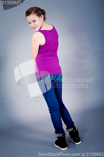 Image of young teenager girl smiling having fun