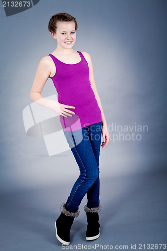 Image of young teenager girl smiling having fun
