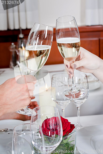 Image of happy smiling couple in restaurant celebrate