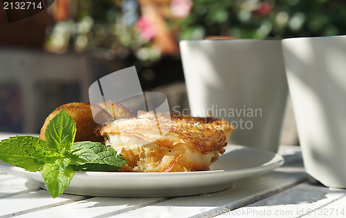 Image of Sweet cakes and beautiful terrace