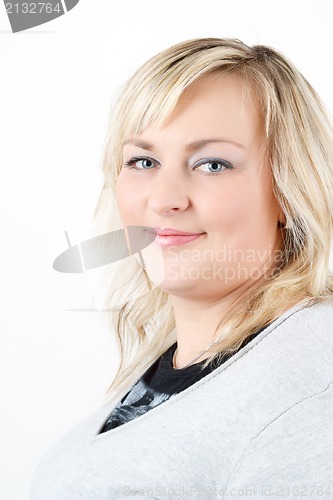 Image of cute smiling relaxing plump woman